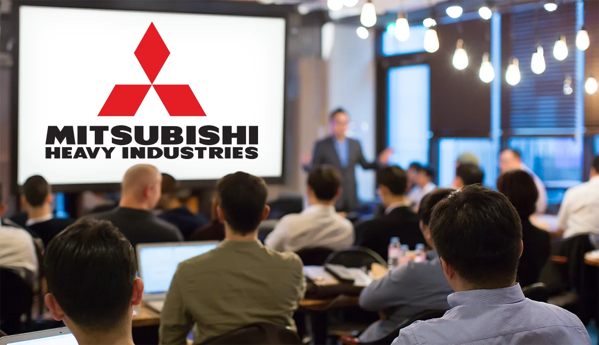 Wykład i szkolenie na temat Budowa i serwis instalacji VRF Mitsubishi Heavy Industries, ludzie słuchający wykładu.
