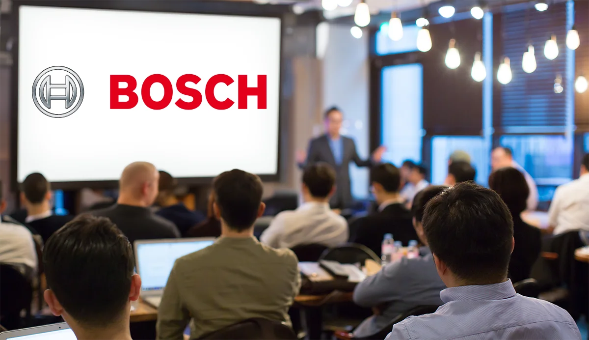 Wykład i szkolenie na temat Instalacja kotłów Bosch, ludzie słuchający wykładu.