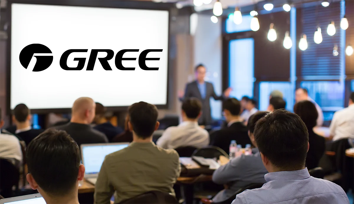 Wykład i szkolenie na temat GREE – RAC, ludzie słuchający wykładu.