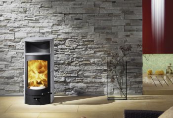 Zalety i rodzaje pieców typu kominek koza