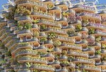 Nowoczesny wieżowiec z elektrownią wiatrową na dachu